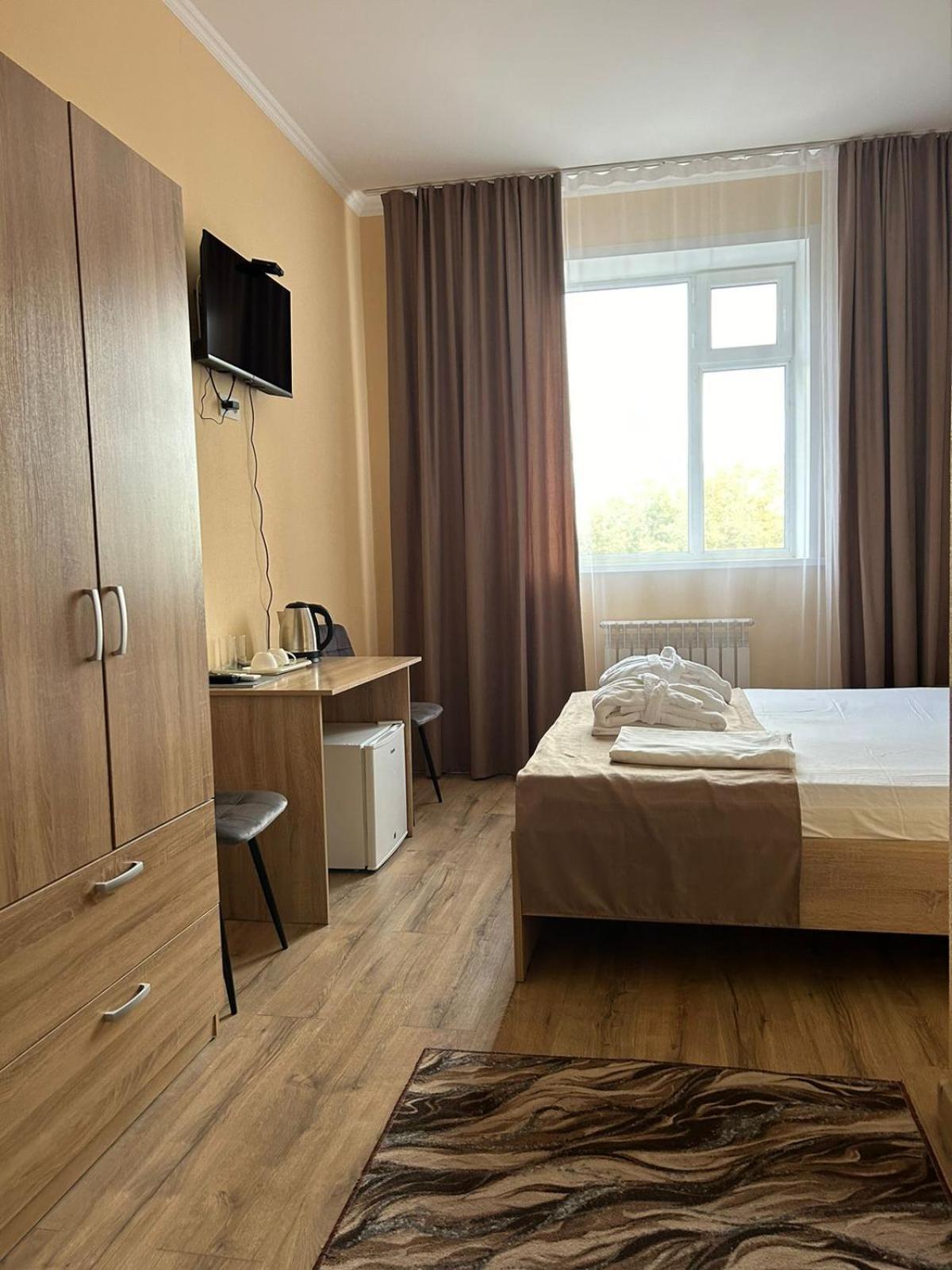 Belon Garden Hotel Astana Bagian luar foto